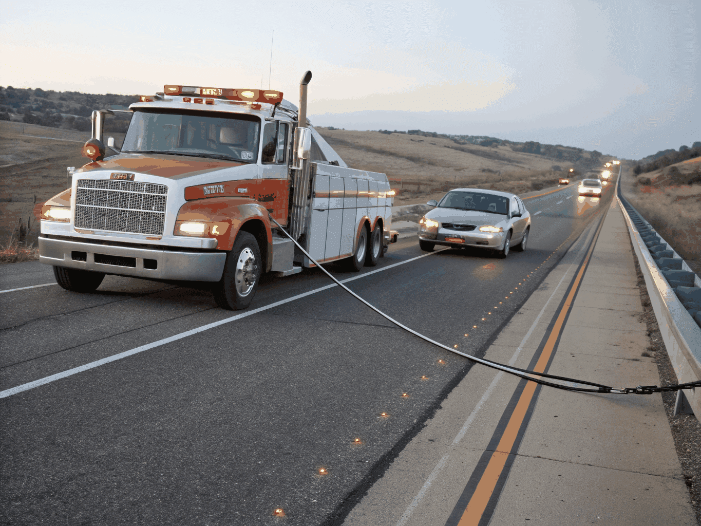 Norfolk towing Route 64 tow truck responding to highway incident